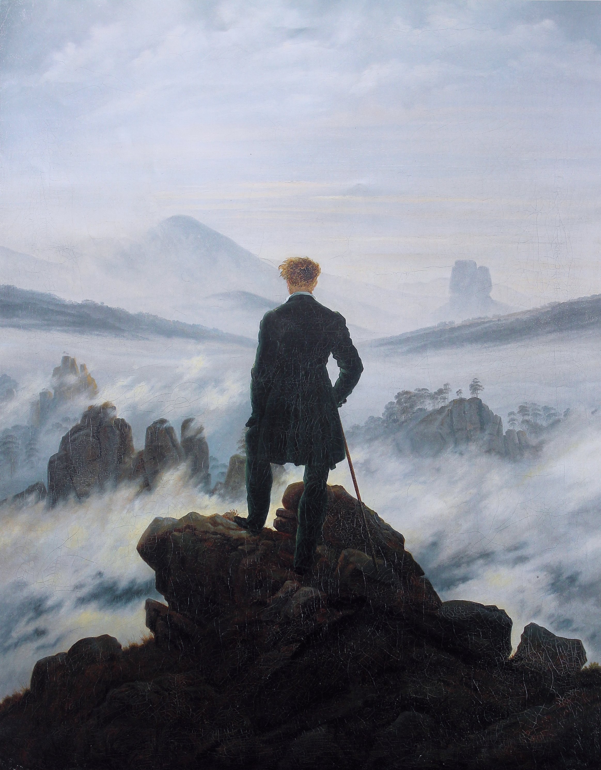 Wanderer above the Sea of Fog, óleo de Caspar David Friedrich, 1818. Una figura de espaldas sobre una roca contempla un paisaje envuelto en niebla. La presencia que rodea sin mostrarse. El contexto como interfaz.